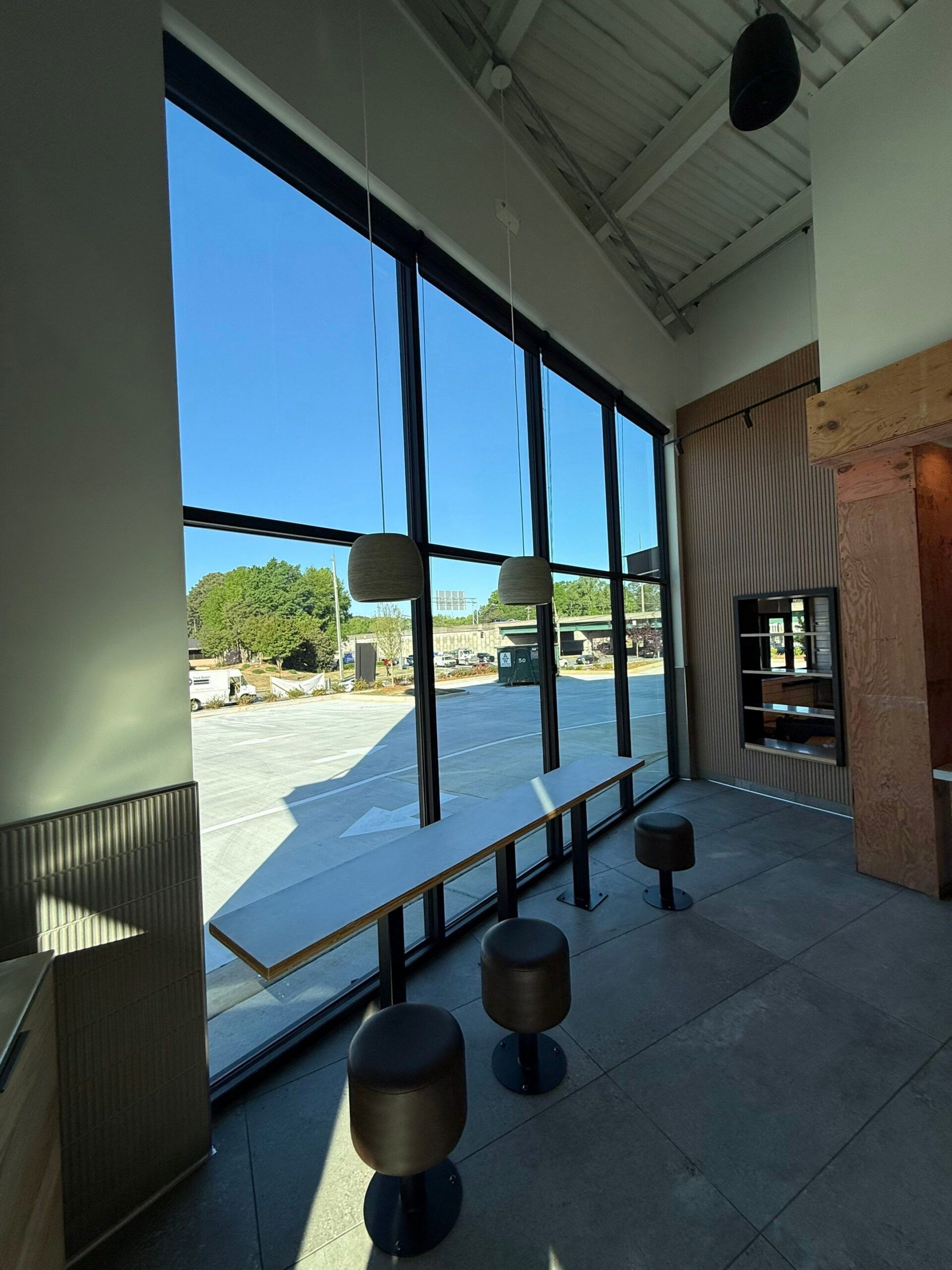 Post-construction cleaning crew on active commercial jobsite